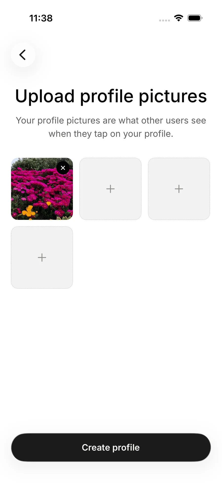 The Upload profile pictures step on iOS with one photo added, three empty slots and a Create profile button